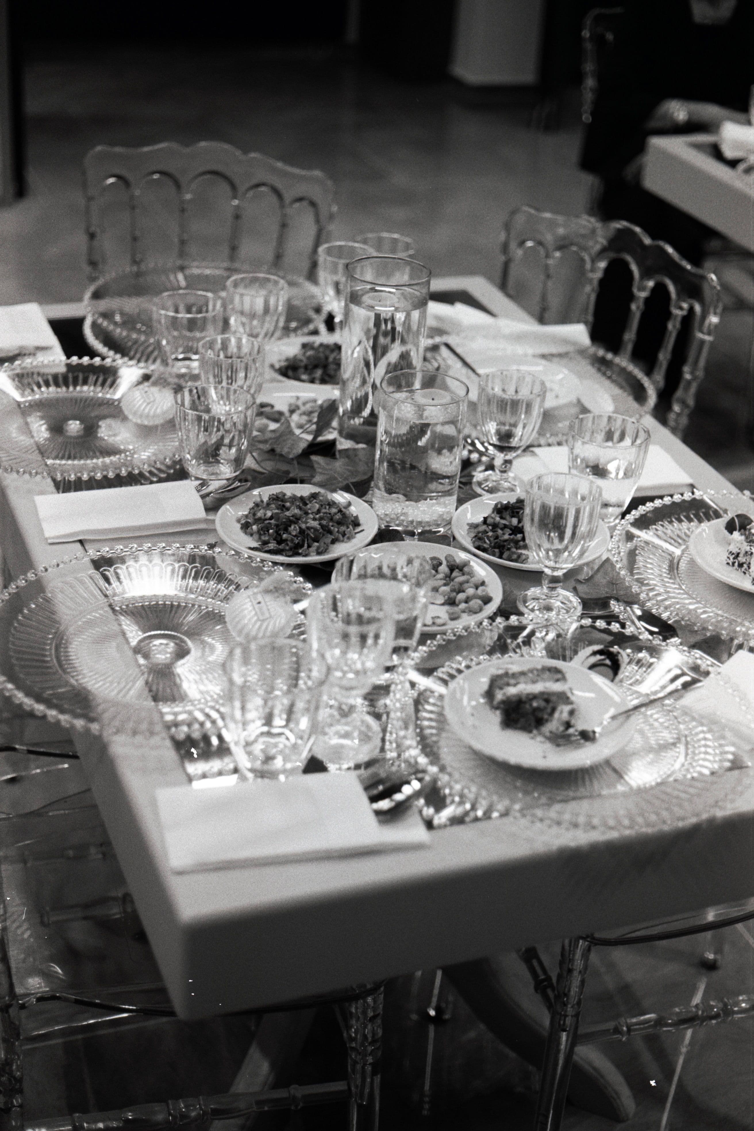 A crystal-and-china table setting at a MALKI gathering